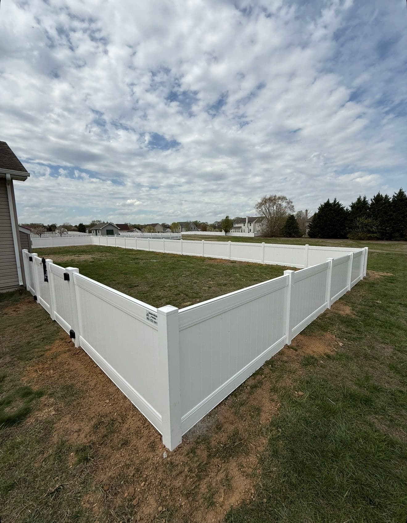 4-Foot White Vinyl Privacy Fence Keeps This Backyard Safe