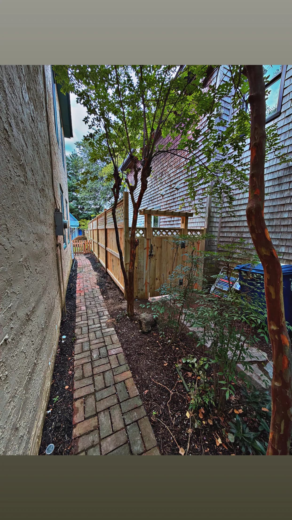 Project Custom Wood Fence with Lattice Top Fits Right In image