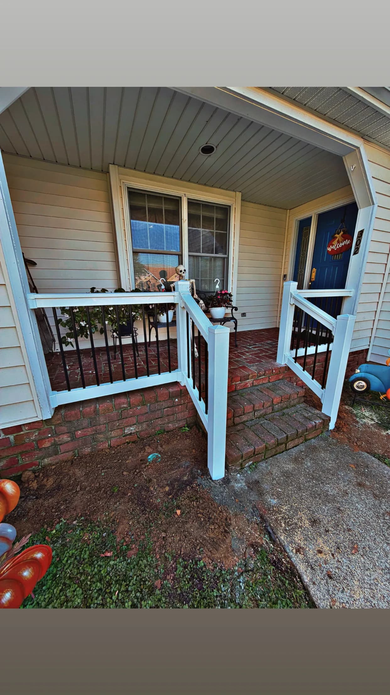 Gallery photos for New Handrail with Black Aluminum Spindles on a Brick Porch: Image #2