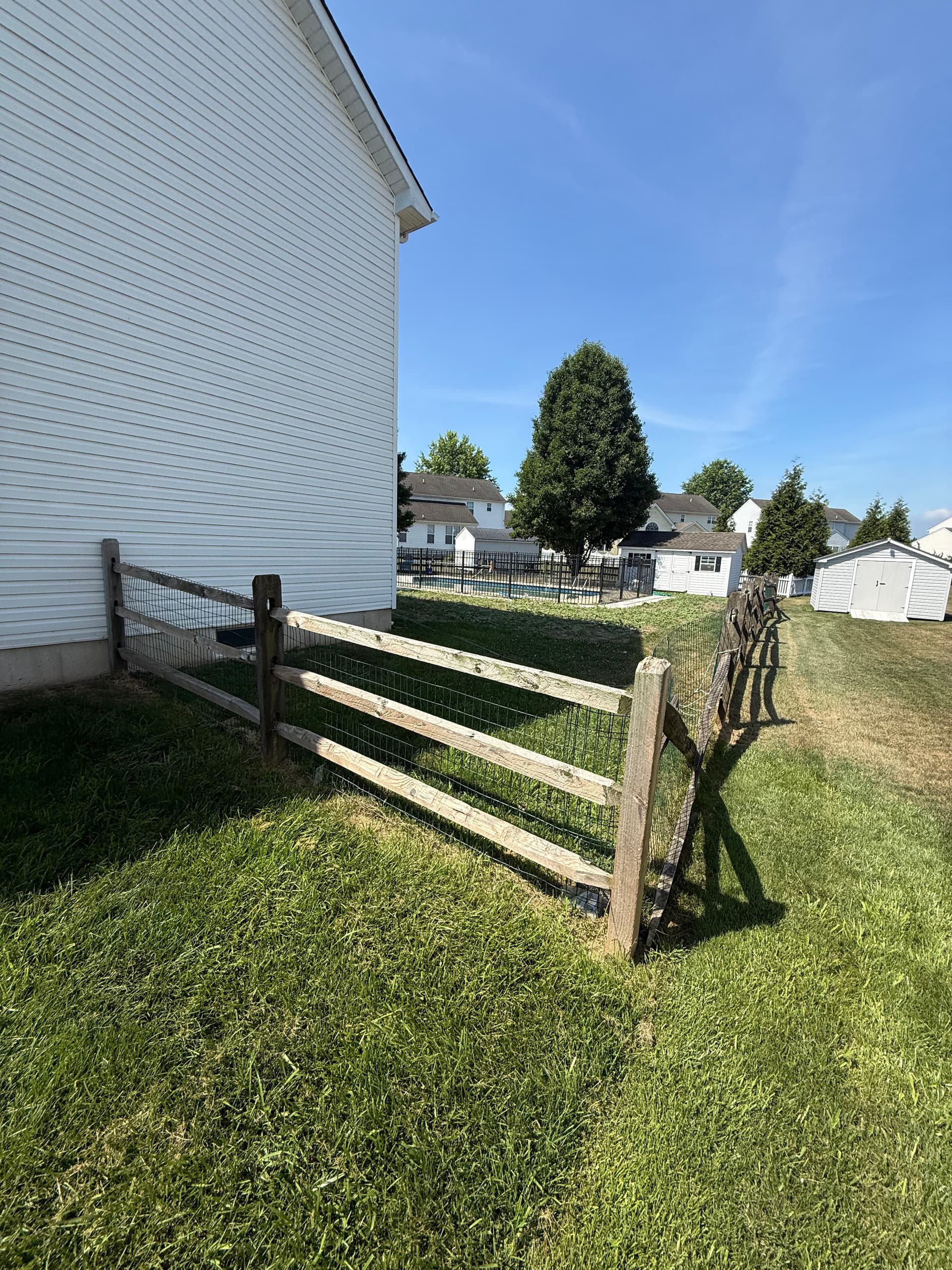 Gallery photos for Old Rotting Fence Replaced With a Clean White Vinyl Install: Image #3