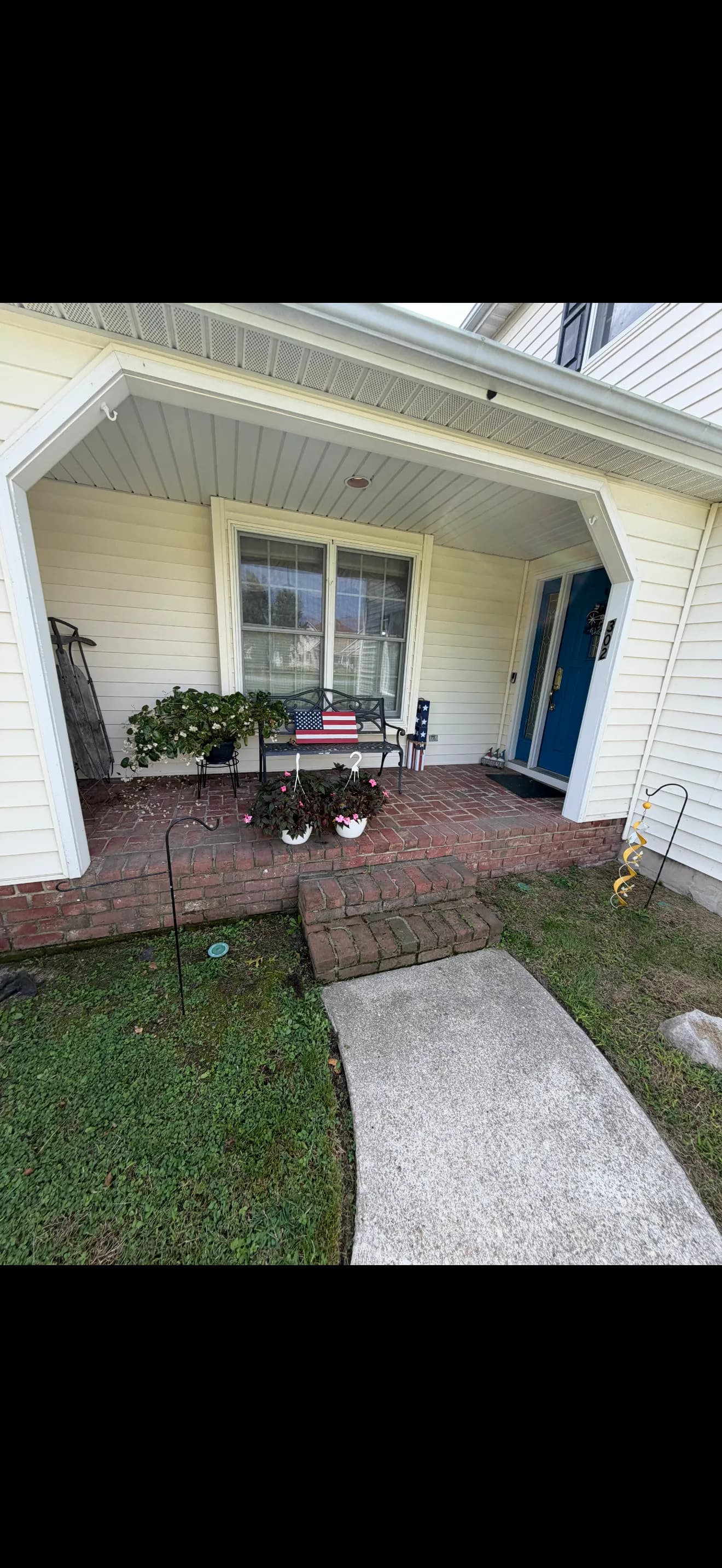 New Handrail with Black Aluminum Spindles on a Brick Porch image