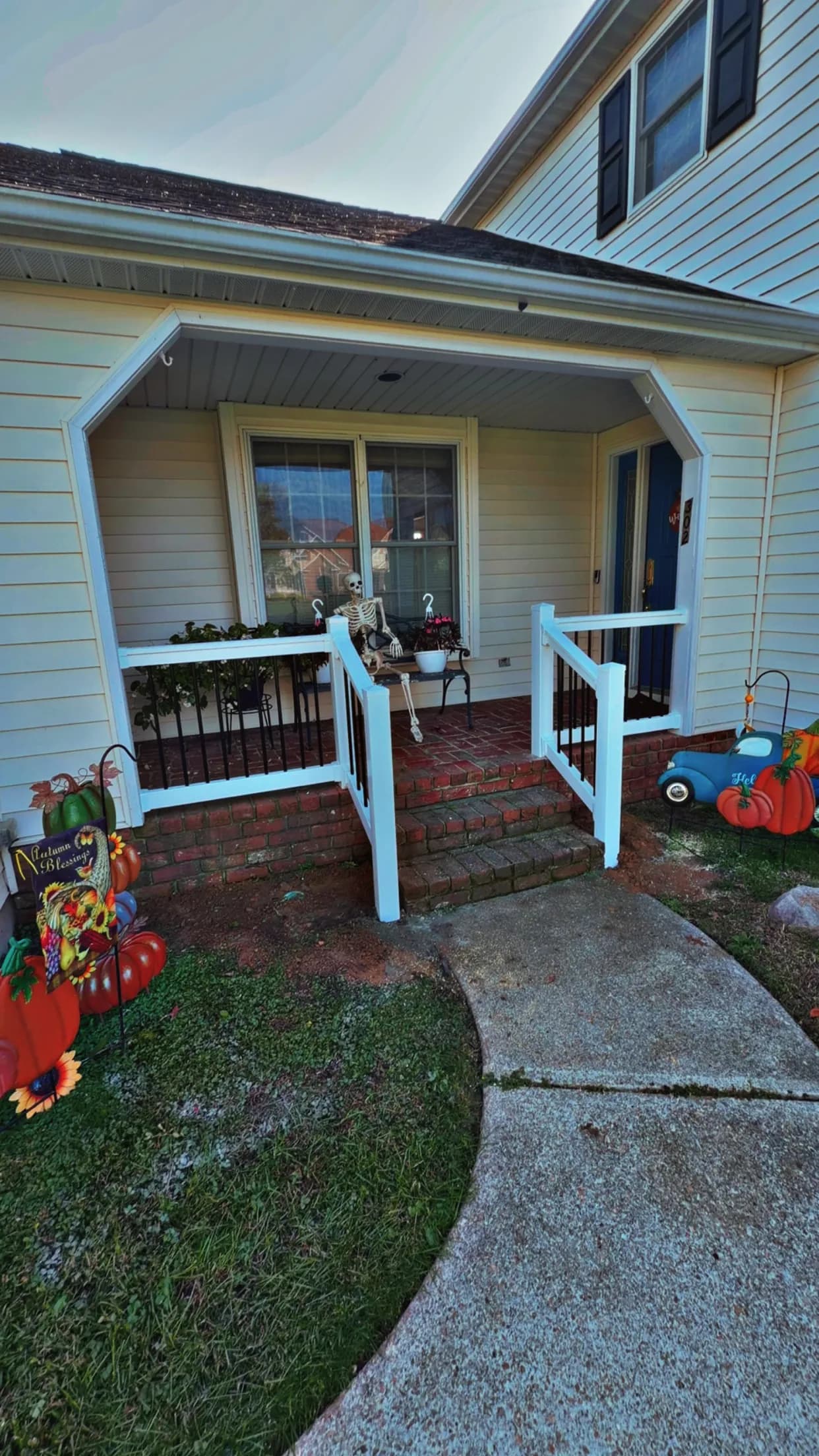 Gallery photos for New Handrail with Black Aluminum Spindles on a Brick Porch: Image #1