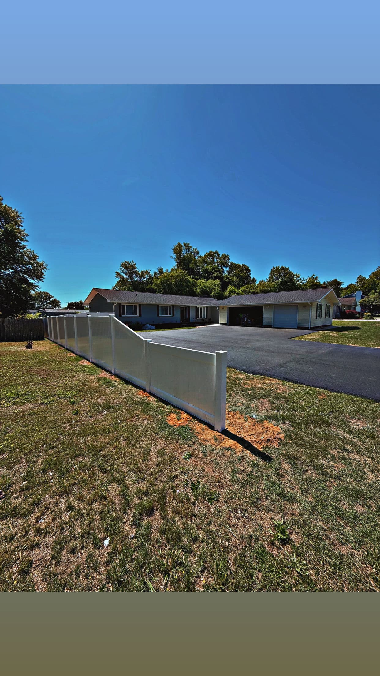 Gallery photos for White Vinyl Privacy Fence With a Custom Height Transition: Image #3