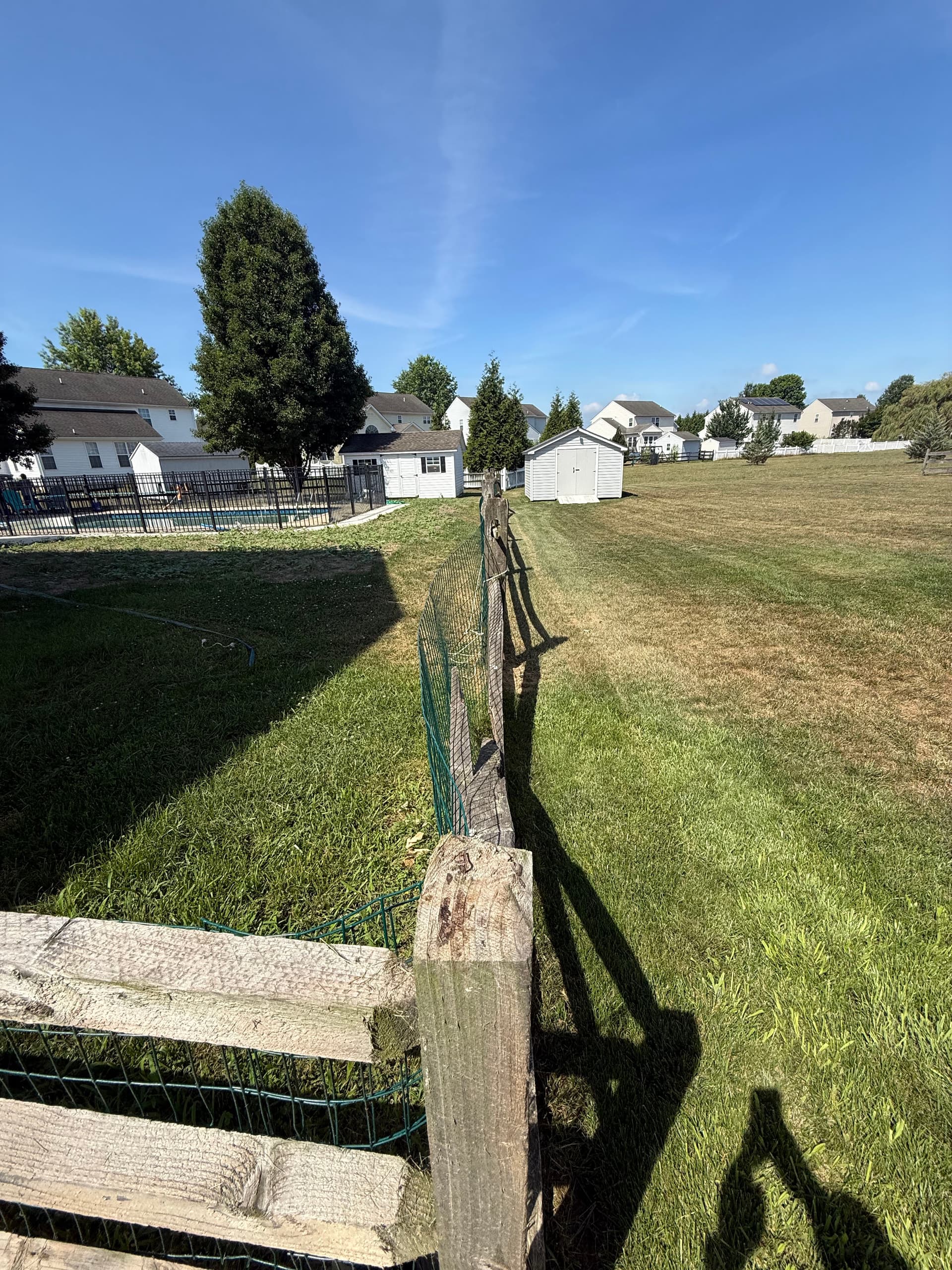 Gallery photos for Old Rotting Fence Replaced With a Clean White Vinyl Install: Image #1